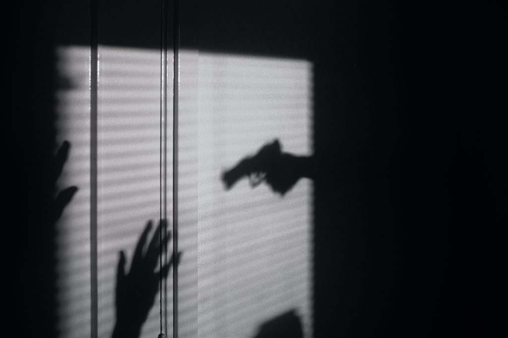 silhouette of a person on the window
