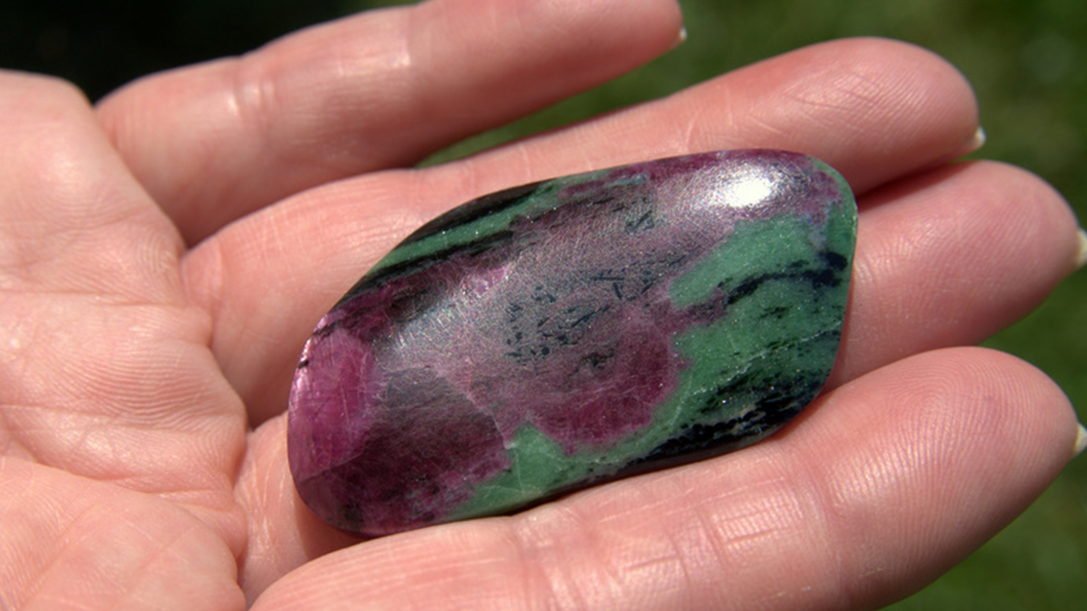 A person holding Ruby Zoisite